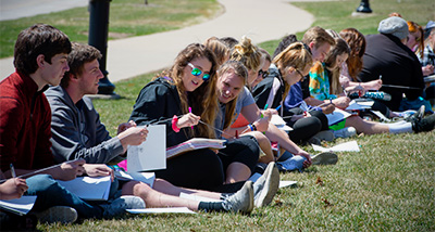 Education students attend class outside