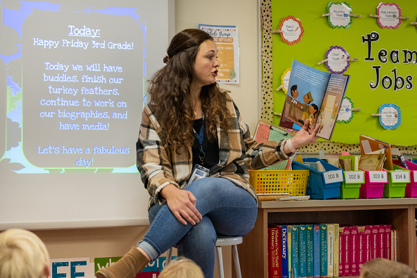teacher reading book to class