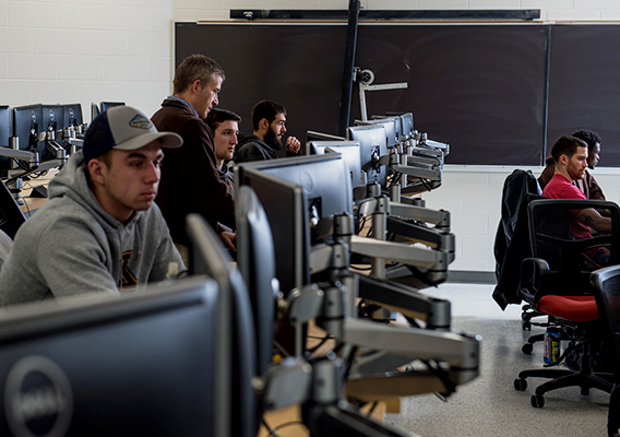 Group of Engineering students working in the campus CAD lab