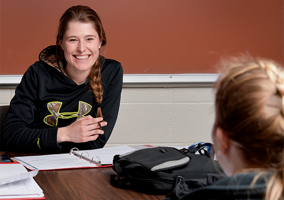 Two students attend a Chemistry tutoring session