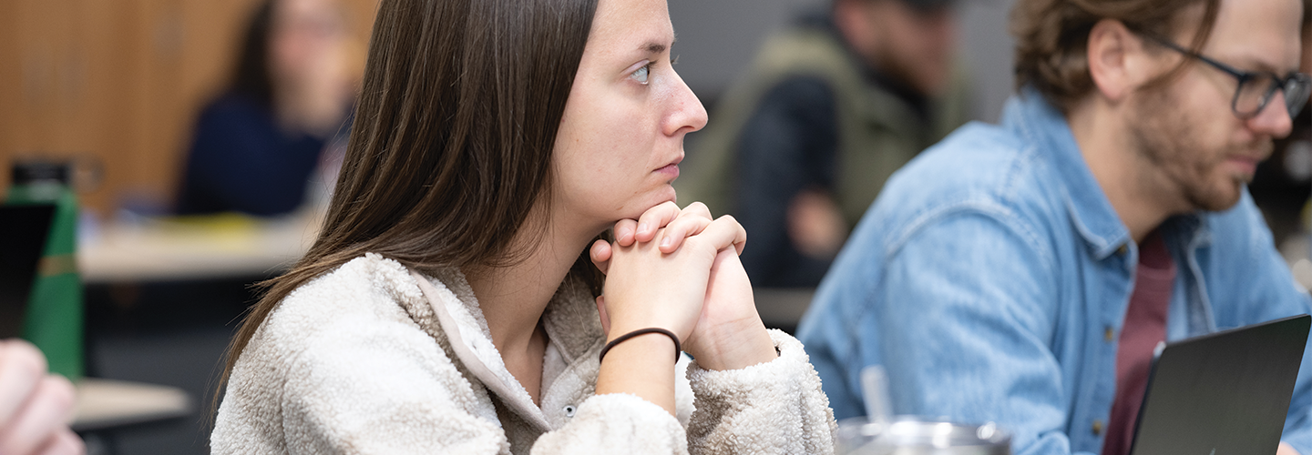 student in class learning