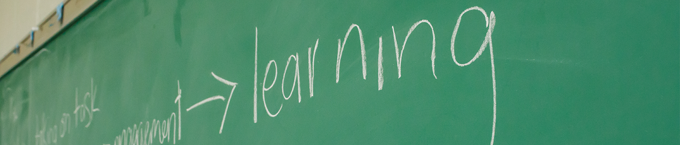 chalk board with the word learning spelled out
