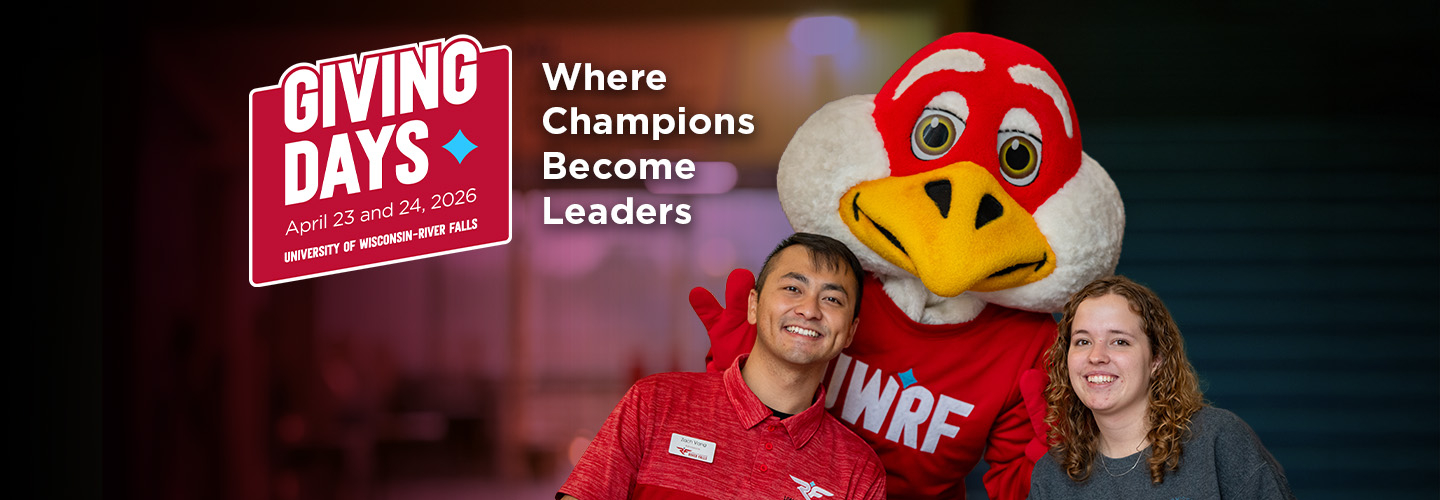 Freddy Falcon with two admissions student workers during new student orientation