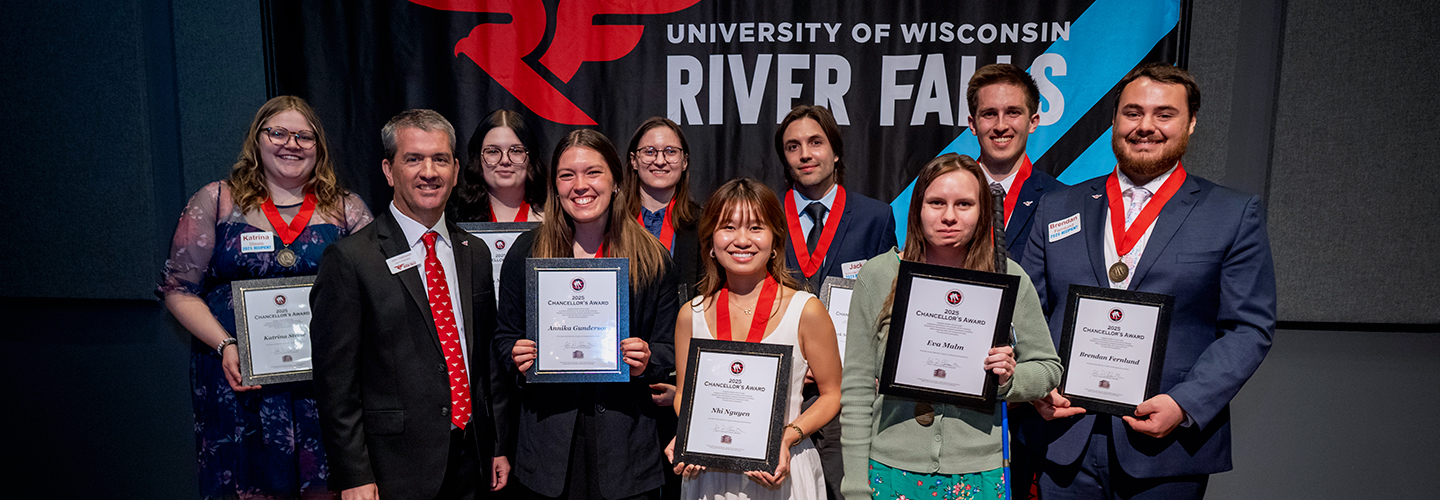 Nine UW-River Falls students were awarded the Chancellor’s Award for Students during a banquet and ceremony on campus. Front row (l to r): Interim Chancellor John Chenoweth, Annika Gunderson, Nhi Nguyen and Eva Malm. Back row: Katrina Steele, Em Murray, Cassie Christian, Jack Schindler Van Hoof, Sasha Resig and Brendan Fernlund.